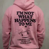 Canguro rosa con capucha, cordones blancos y bolsillo tipo canguro. Estampado en el pecho con la frase "I'm not what happens to me, I am what I choose to become. Duxon Jeans" y un dibujo de un fantasma en patineta.