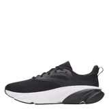Championes Under Armour modelo UA Rogue 6, color negro con entresuela blanca. Diseño deportivo con capellada de malla transpirable y pasadores de cordones.