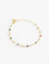Pulsera dorada con cadena de eslabones y cuentas redondas de colores con diseño de ojo turco.