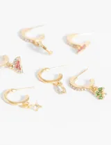 Set de aros dorados con forma de argolla y dijes colgantes con forma de trébol, estrella, lágrima, sandía y moño.