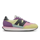 Championes New Balance modelo WS237PW1, de dama, con capellada multicolor en tonos pastel: rosa, amarillo, lila, celeste y negro.