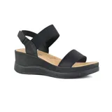 Sandalias de plataforma color rosa con tiras de ajuste elásticas.