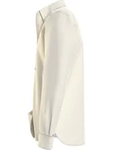 Camisa de hombre Tommy Hilfiger de corte regular, color crema con microestampado de puntos y logo bordado en el pecho.