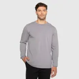Buzo gris de manga larga con cuello redondo, corte regular fit y diseño liso.
