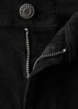 Jeans de terciopelo color negro, tiro alto y estilo flare, con diseño de cinco bolsillos y trabillas para cinturón.