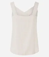 Blusa sin mangas color blanco roto, con escote en V cruzado y breteles anchos.