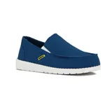 Zapato casual de hombre tipo slip-on, color azul marino, con elásticos laterales y suela blanca.
