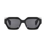 Gafas de sol unisex negras con forma geométrica y lentes grises. Fabricadas con plástico reciclado y filtro UV 400.