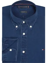 Camisa de manga larga Tommy Hilfiger de algodón chambray azul. Tiene cuello abotonado, cierre con botones y logo bordado en el pecho.