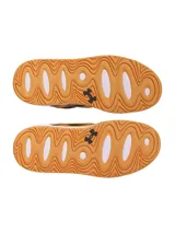 Championes Under Armour modelo Court Anatomix, con diseño bicolor en amarillo y negro. Presentan una parte superior con superposiciones resistentes, entresuela de EVA acolchada y suela exterior de goma gruesa para mayor tracción.