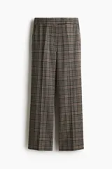 Pantalón de vestir con estampado a cuadros Príncipe de Gales en tonos marrón, negro y beige. Presenta un corte recto de pierna ancha, talle alto con pretina prolongada y cierre oculto.