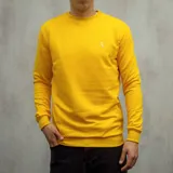 Buzo deportivo amarillo de algodón con cuello redondo y puños acanalados.