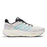 Championes de running New Balance Fresh Foam X 1080, color gris claro con detalles en negro y celeste.