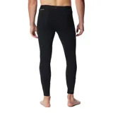 Calza técnica de compresión color negro, diseñada como primera capa térmica. Cuenta con tecnología reflectante para retener el calor corporal y tejido hidroabsorbente para eliminar el sudor. Presenta costuras planas ergonómicas y elasticidad en cuatro direcciones para mayor movilidad.