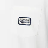 Remera blanca de manga corta Rip Curl, con bolsillo en el pecho que incluye un parche distintivo de la marca.