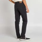Pantalón de jean negro de corte slim con cinco bolsillos.