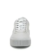 Sneakers grises Caterpillar modelo Amp Canvas, confeccionados con capellada de lona recubierta en poliuretano, detalles plateados texturizados en la zona de los cordones y suela de goma tipo plataforma con ranuras.