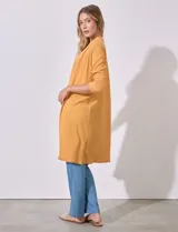 Cardigan blanco texturado con mangas 3/4.