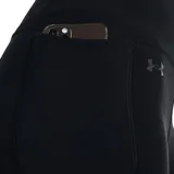 Calza capri de training Under Armour color negro, tiro alto y logo en la cintura.