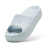 Sandalias de plataforma Puma Shibusa, color celeste, con logo en relieve en la tira.