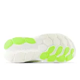 Championes de running New Balance Fresh Foam More v4 para dama, color rosa con detalles en blanco y verde flúor.