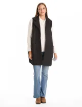 Chaleco largo de paño marca Barrington, color negro, con cuello solapa, cierre frontal con botones y bolsillos delanteros aplicados.