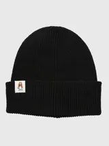 Gorro de lana negro tipo beanie con vuelta, tejido en canalé y parche frontal con el logo del perro de Hush Puppies.