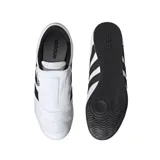 Championes Adidas Tekwen blancos con las tres tiras negras en los laterales.