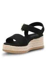 Sandalias de plataforma tipo espadrille con capellada de material sintético negro, tira ajustable al tobillo con hebilla metálica dorada y suela de yute con base de goma.