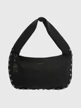 Cartera tipo hobo de la marca Hush Puppies, color negro, con diseño de asa única integrada y detalle de tachas metálicas plateadas en los laterales y la base. Incluye un tag colgante con el logo de la marca.