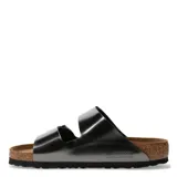 Sandalias Birkenstock modelo Arizona, color negro metalizado, con doble tira ajustable mediante hebillas metálicas. Presentan plantilla anatómica de corcho y suela de goma antideslizante.