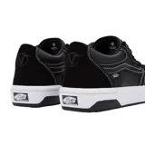 Championes Vans Rowan 2 negros con detalles en blanco.
