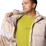 Campera reversible Columbia modelo Wallowa, color beige, con diseño acolchado, cuello alto, cierre frontal con solapa, bolsillos frontales con solapa y puños elásticos.