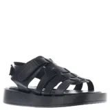 Sandalias de estilo franciscano con diseño tejido, confeccionadas en material sintético color negro. Presentan una suela tipo plataforma plana y cierre con ajuste de velcro en el talón.
