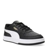 Championes urbanos Puma modelo Caven 2.0 para mujer, de color negro íntegro. Confeccionados con una parte superior de material sintético que incluye perforaciones en la puntera para mayor ventilación, cierre de cordones al tono y suela de goma. Su diseño está inspirado en la estética del básquetbol de los años 80.
