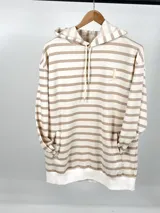 Canguro oversize de algodón rústico a rayas horizontales color beige y crudo, con capucha y bolsillo tipo canguro.