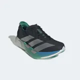 Championes de running Adidas Adizero Adios Pro 4, color negro con tres franjas plateadas. La mediasuela es blanca con degradado en tonos verde menta y azul turquesa. El forro interior es verde esmeralda.