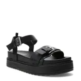 Sandalias de plataforma baja Miss Carol modelo Taze, color negro, con diseño de tiras anchas, hebillas metálicas decorativas y tira ajustable en el talón.