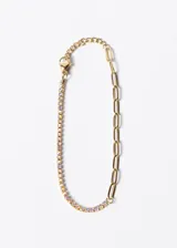 Pulsera dorada con una hilera de circonias de colores y una cadena de eslabones grandes.