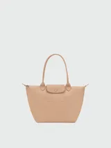 Bolso tote Longchamp modelo Le Pliage One en tamaño mediano, color bordó, con diseño minimalista, cierre superior y doble asa de mano.