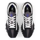 Championes New Balance modelo XC-72, con capellada gris, detalles en negro y logo blanco.