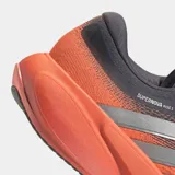 Championes de running Adidas Supernova Rise 3, color naranja con detalles en gris oscuro y plateado. Presentan empeine de tejido técnico transpirable, mediasuela con tecnología Dreamstrike+ para mayor amortiguación y suela Lighttraxion para un agarre óptimo.