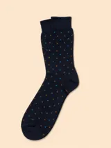 Medias de algodón color azul marino con estampado de pequeños puntos en tonos naranja y celeste.