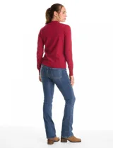 Buzo de tejido de punto color beige, con cuello alto y mangas largas. Presenta un diseño de calce ajustado con puños y ruedo acanalados.