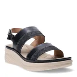 Sandalias de plataforma baja con tiras anchas en color beige y detalles texturizados brillantes. Posee cierre con tira ajustable en el talón y plantilla acolchada.