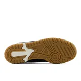 Championes New Balance 550 de dama, color negro con detalles en animal print y beige.