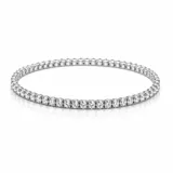 Pulsera tipo tennis de diseño continuo, compuesta por una hilera de zirconios engarzados en estructura plateada. Cuenta con un sistema elastizado que permite un ajuste cómodo a la muñeca.