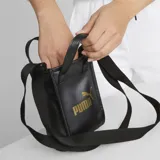 Bolso tote mini Puma Core Up, color negro con logo dorado estampado en el frente, doble asa corta y correa larga ajustable para el hombro.