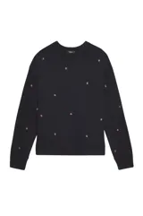 Buzo negro de corte recto con cuello redondo y mangas largas. Estampado de estrellas doradas.