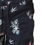 Short de baño negro con estampado de hojas de palma blancas y detalles de destellos de luz en naranja y celeste.